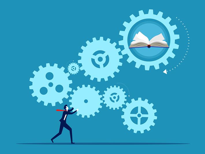 Illustration of man pushing cogs linked to books representing work-integrated learning