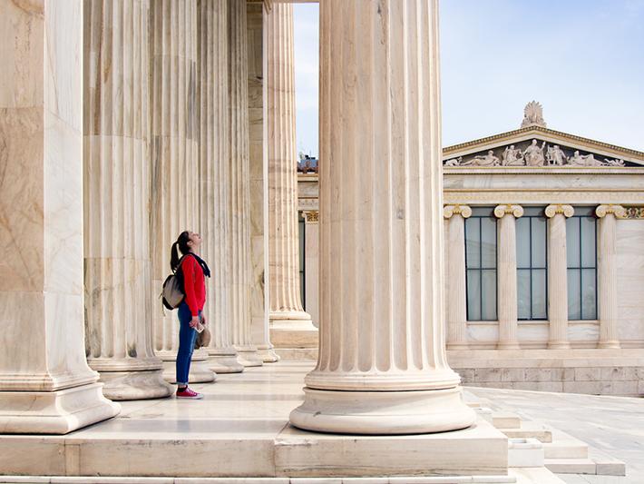 Young woman outside Athenian Academy