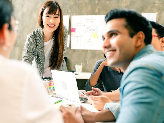 Academics discuss ideas in a meeting