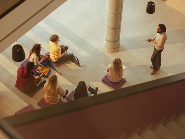 Students in a lecture, pictured from above