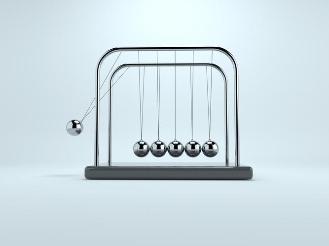 Newton's cradle on a white background