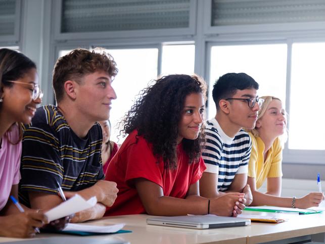 Students listen attentively during a class