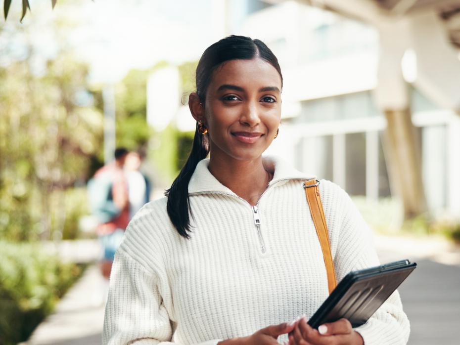 A student smiling to camera