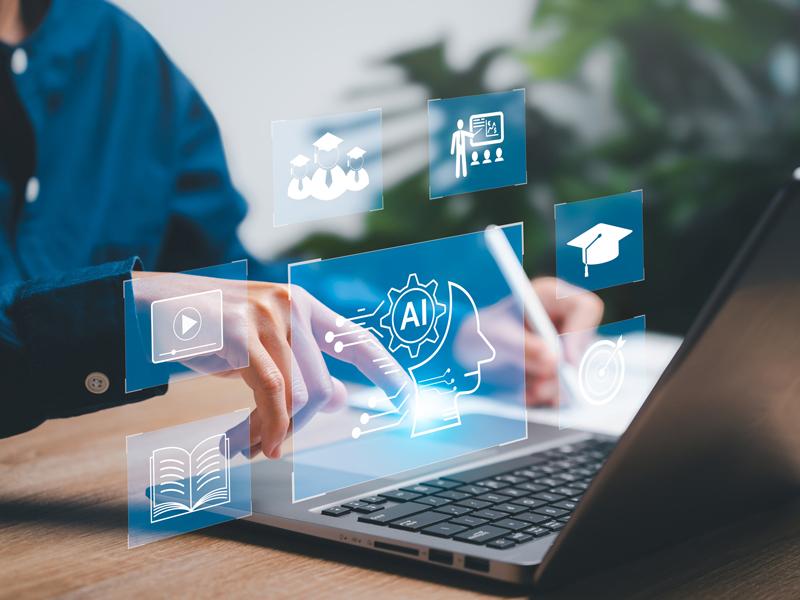 Laptop showing holograms of AI features