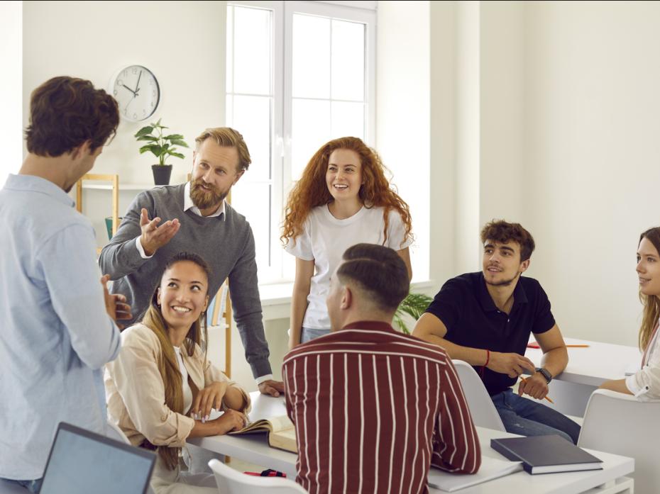 Professors in a classroom having a meeting 