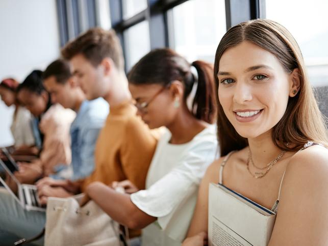 Students sit together
