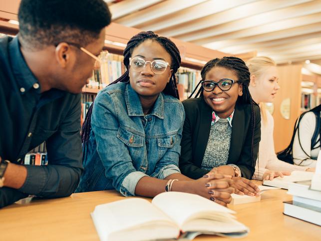 Black students talking amongst themselves