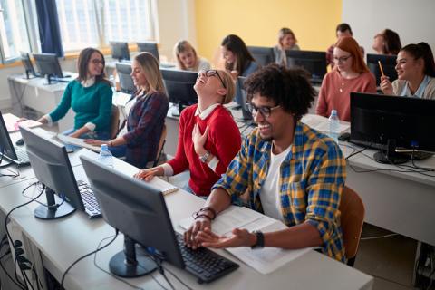 students laughing in class