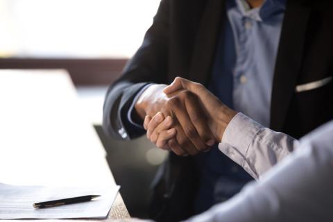 Two men shaking hands