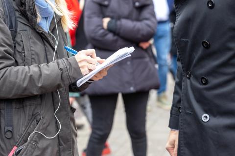 A student practices their interviewing skills