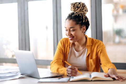 Student studying at her laptop