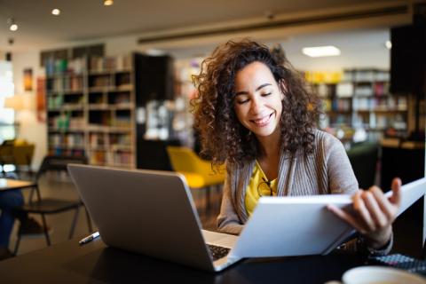 Female scholar in library