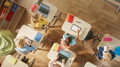 Students studying at individual desks