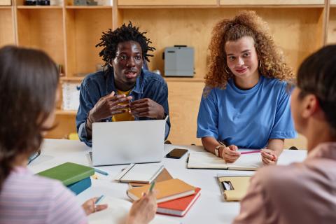 Diverse group of students working together