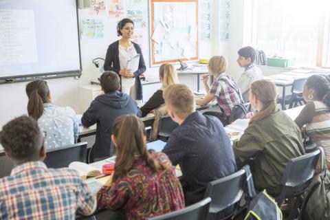 Students learning english in class