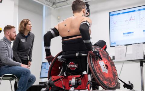 Doctoral student Tom O’Brien performing physiological profiling with a GB wheelchair rugby player in our campus facilities