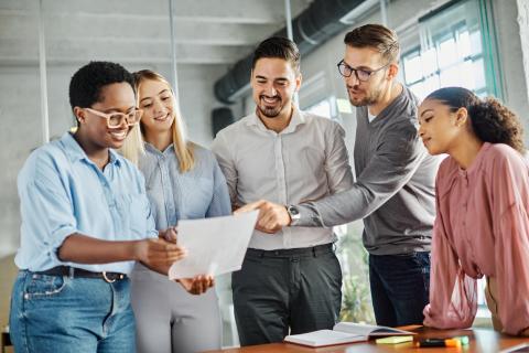 A group of business students working together on a project