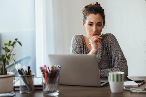 Young woman working at laptop