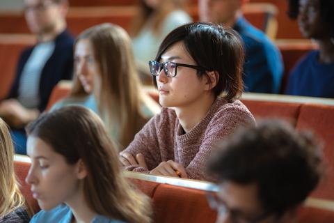 Students in a university lecture hall