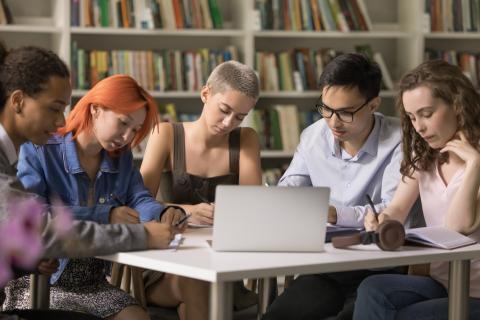 Students working as a group in the library