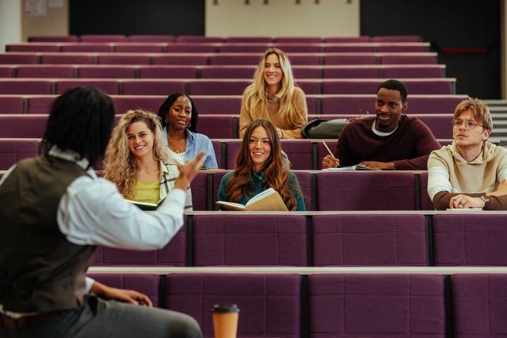 Students talk with their lecturer 