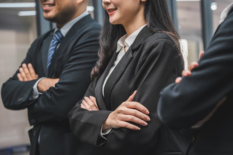 Young businesspeople in suits