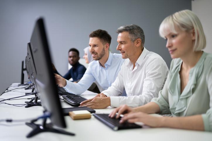 Managers work at their computers