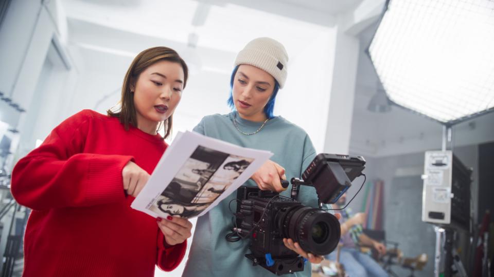 Two film students working on a project together