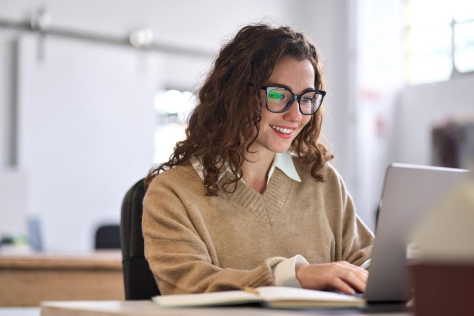 A student at her laptop