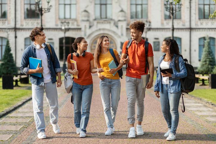 International students laugh together on campus