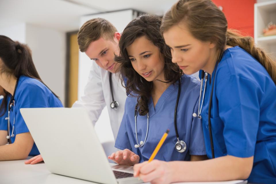 Medical students working on a project together