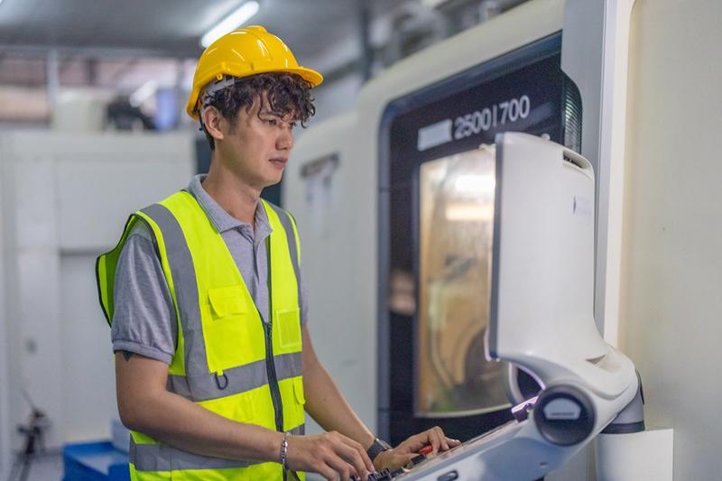 Young Asian robotics trainee