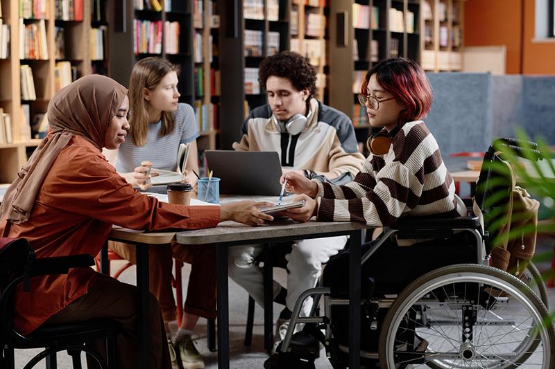 Students working together in library