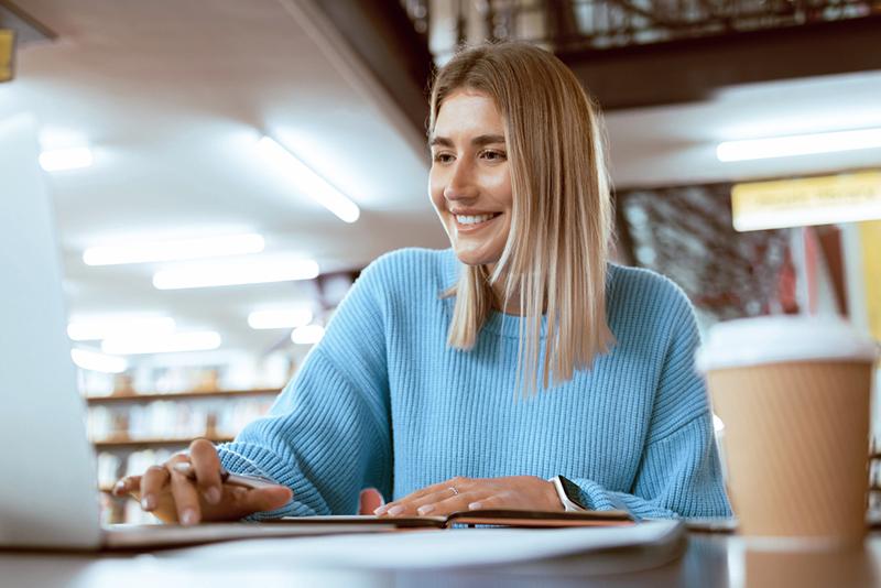 Young female student at laptop