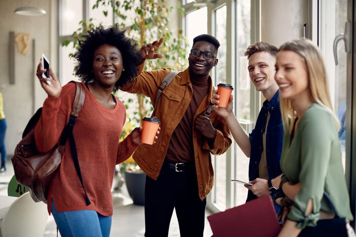 Students welcome each other on campus