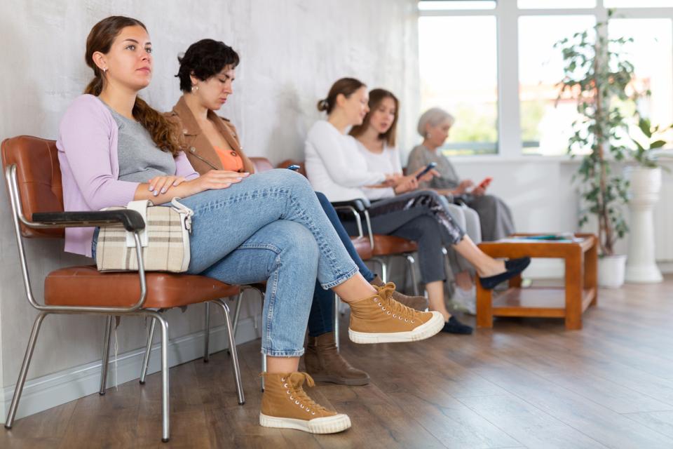 Students sitting in a queue 