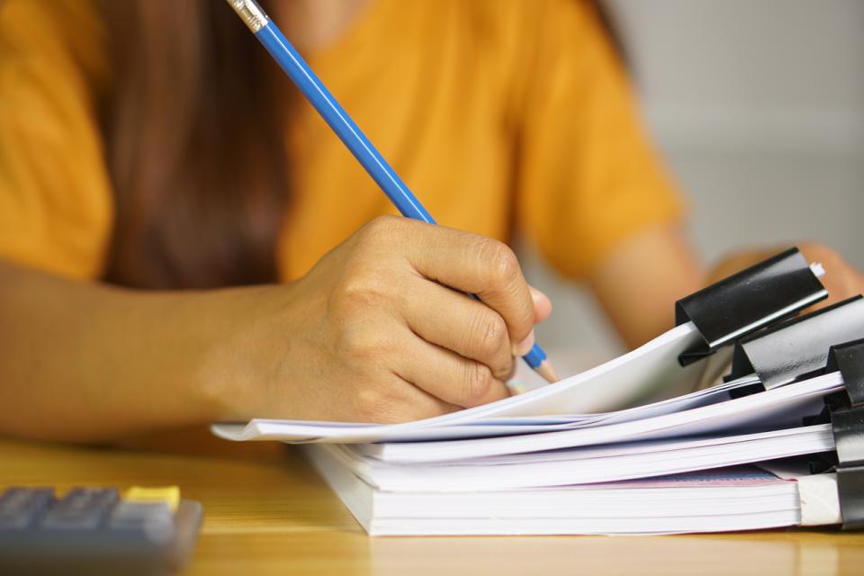 A teacher marking students' work