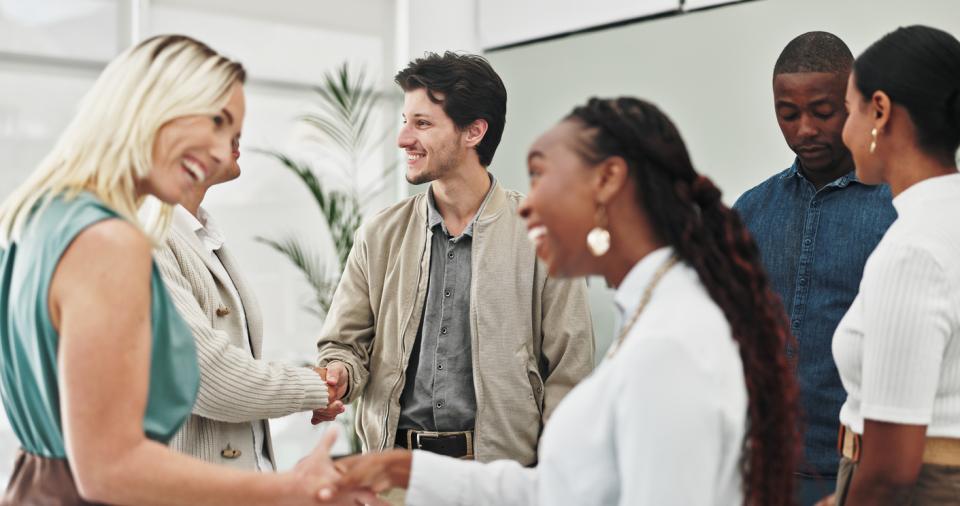 A group of professionals shaking hands