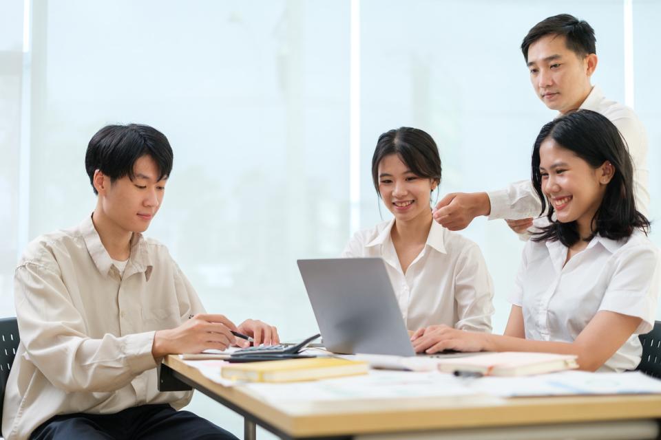 A group of students working together in a classroom