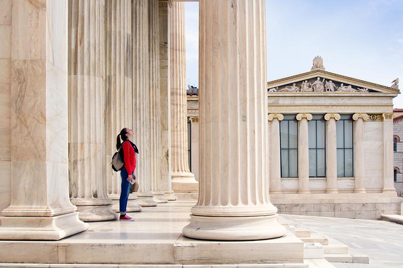 Young woman outside Athenian Academy