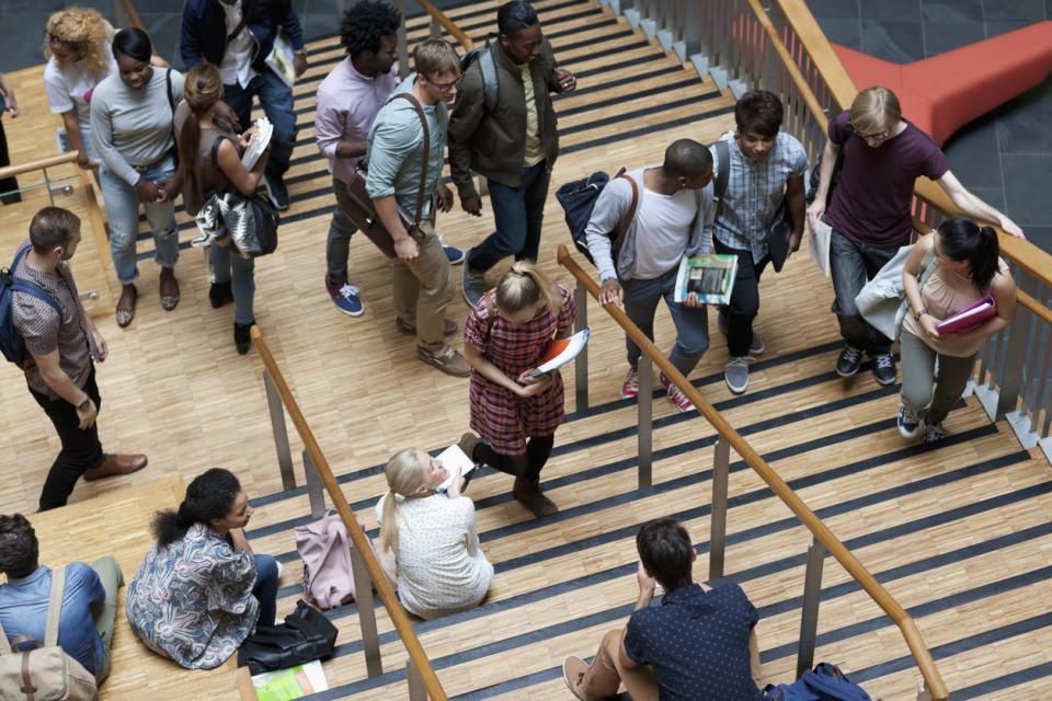 Top down view of students walking between classes