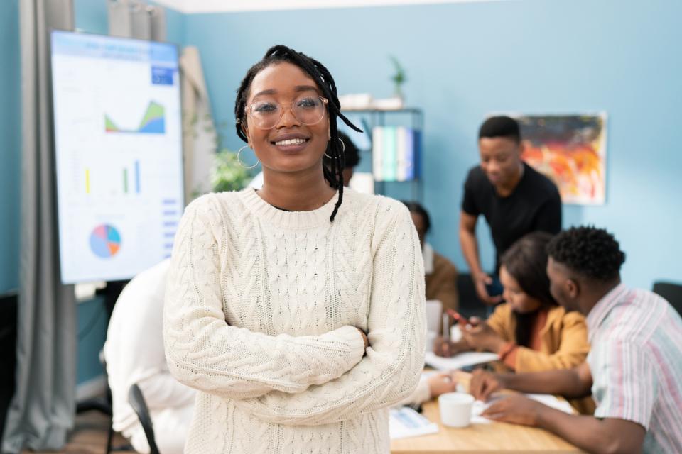 A student smiling to camera