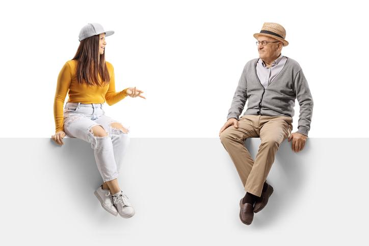 A student and an old man chat in a virtual surrounding