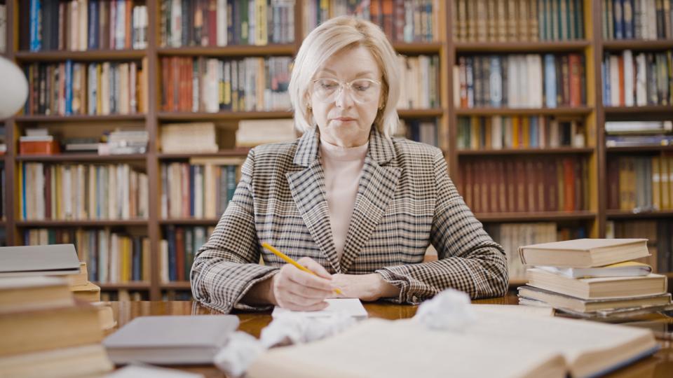 An academic working in a library