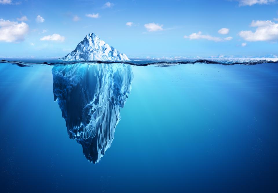 An iceburg seen from below the water line