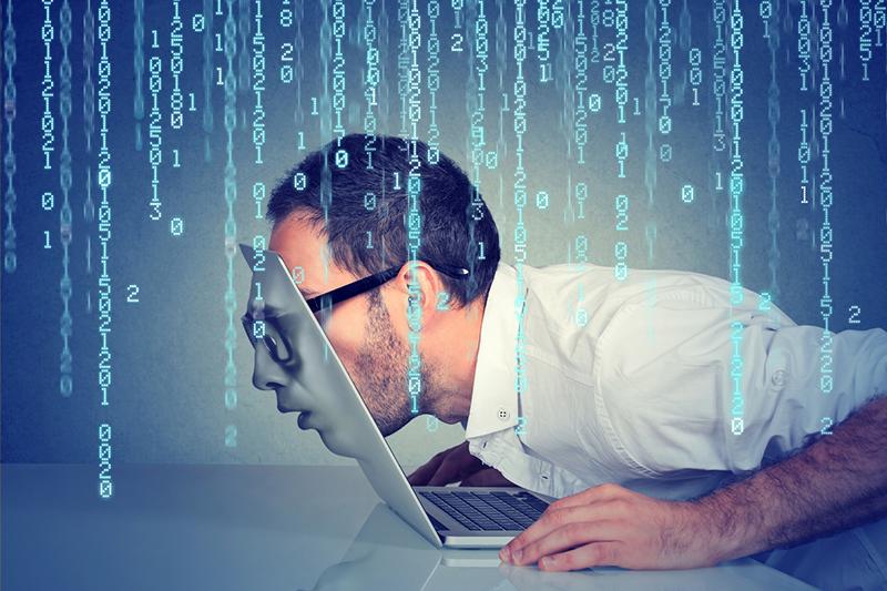 Man falling into laptop screen with numbers in cords in background