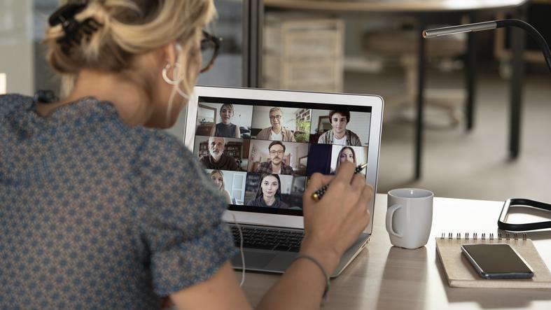 A student on a Zoom call with other online students