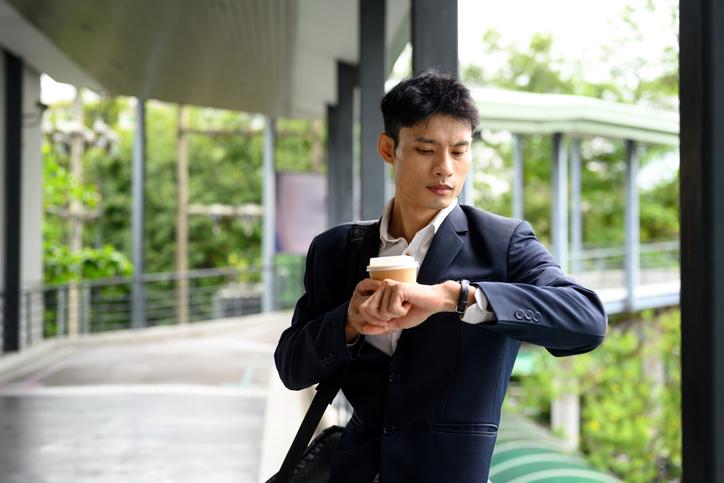 A part-time doctoral student travels between work and study
