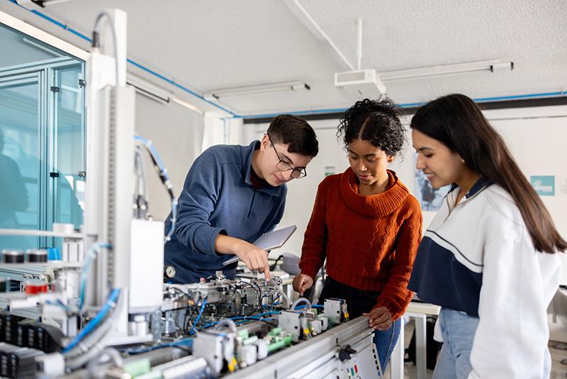 Robotics students in a practical university class