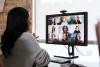 A woman communicates with classmates in a synchronous remote classroom